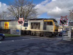 Rhiwderin level crossing and 60072 coming from Machen Quarry